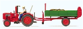 Zdjęcie Traktor z przyczepą.